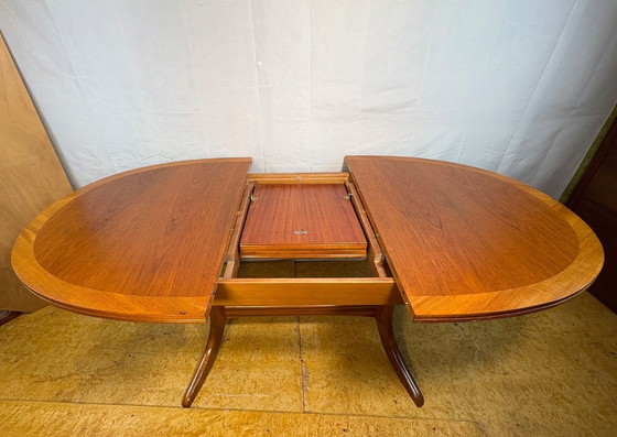 Image 1 of Mid-Century Retro Vintage Teak Extending Dining Table by Nathan 1960s  Seats Up to Six • Stylish & Practical • British Design Cl
