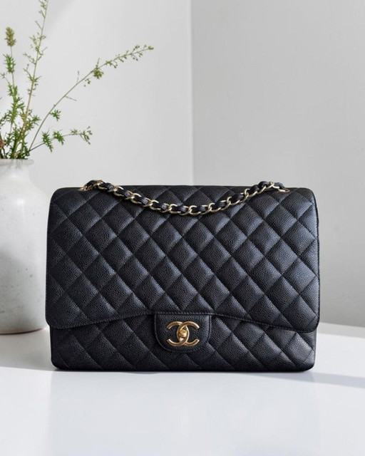 Borsa Chanel Classic Flap Maxi - Caviar Double Flap 33CM Trapuntata Nera Dettagli Oro