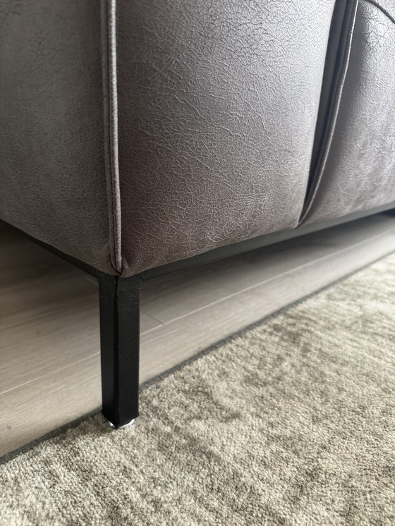 Image 1 of 3 sits bank Sowerby