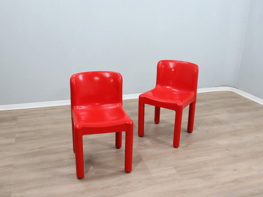Set van twee Kartell Model 4875 stoelen uit de jaren 70, ontworpen door Carlo Bartoli, in rode kleur.