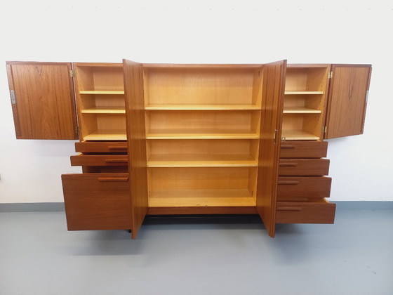 Image 1 of Tall, modernist, vintage Scandinavian sideboard in teak and black metal from the 1960s