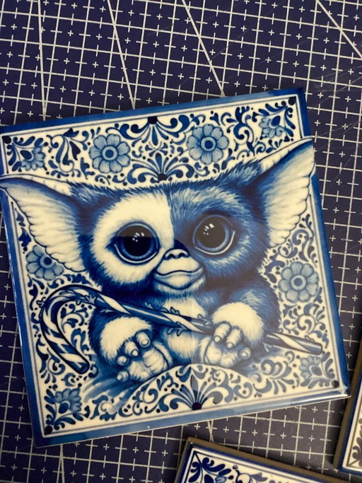 Decoratieve tegel 11x11x0,6 cm. Gremlins