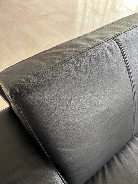 Image 1 of Black leather 2.5 and 3-seater sofa, 4 years old