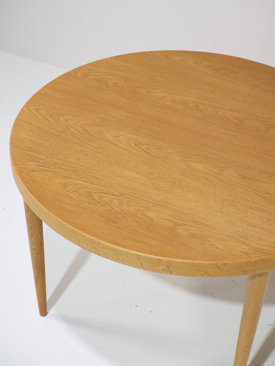 Image 1 of Extendable round dining table oak Danish