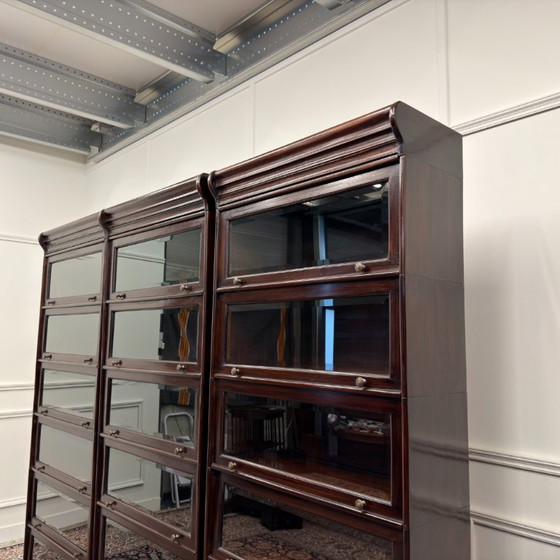 Set of Classic English Globe Wernicke Bookcases – Glass, Wood (photo 8 of 15)