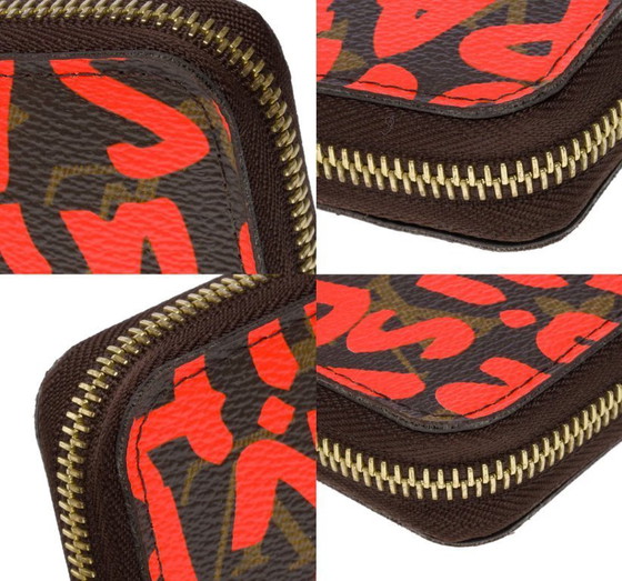 Image 1 of Accessorio LOUIS VUITTON Zippy in tela marrone - 101586