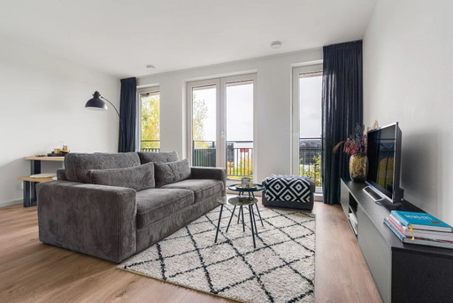 2,5-zits bank met hocker/poef – nette staat – modern grijs