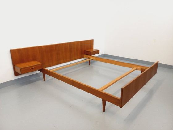 Image 1 of Vintage Scandinavian teak double bed from the 1960s with integrated bedside tables
