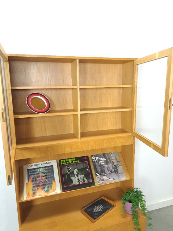 Image 1 of Tall LP display case with glass doors and reading shelf from Sweden