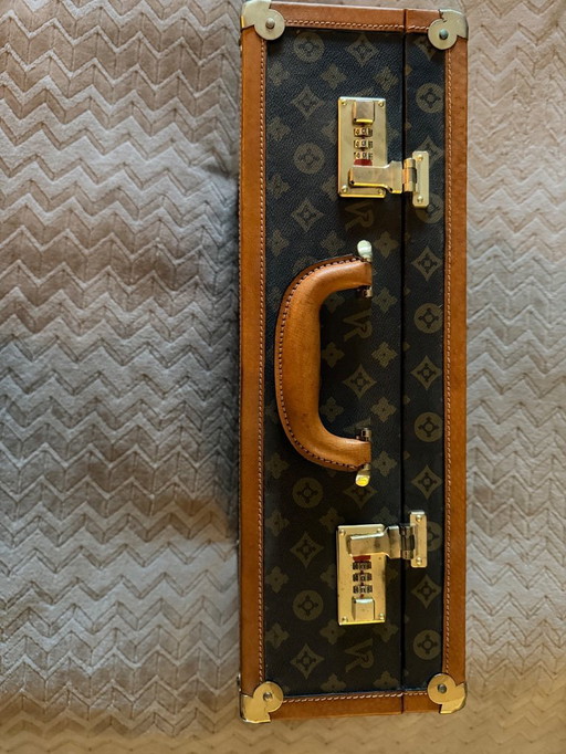 Beautiful leather, vintage suitcase from VR Diann to Louis Vuitton.