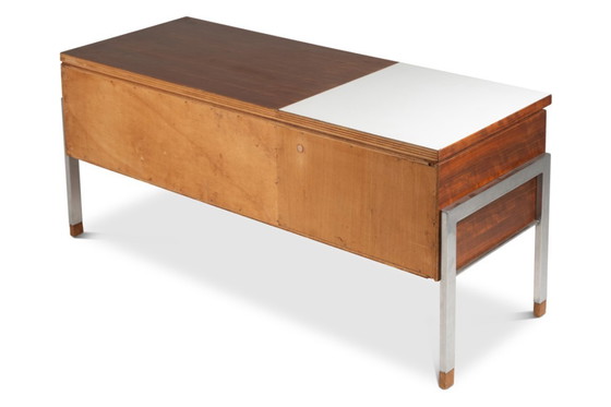 Image 1 of Pareja de cómodas bajas de teca y metal cromado. Años sesenta.