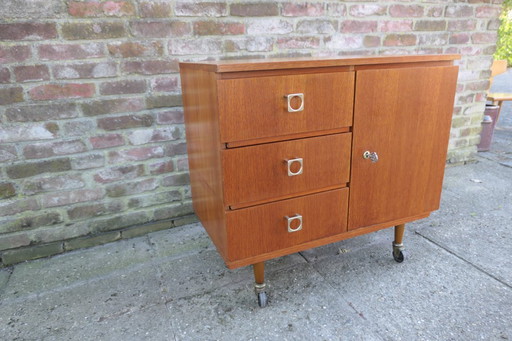 Vintage teak cabinet on wheels