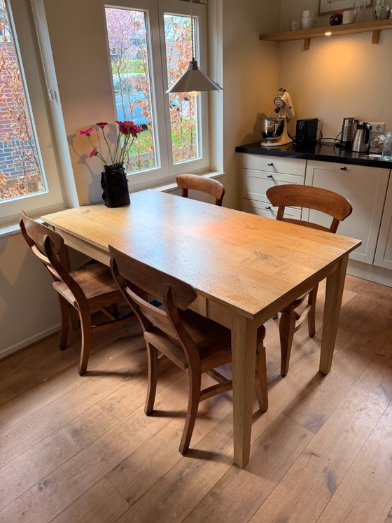 Image 1 of Solid Oak dining table with drawer "framstyle"