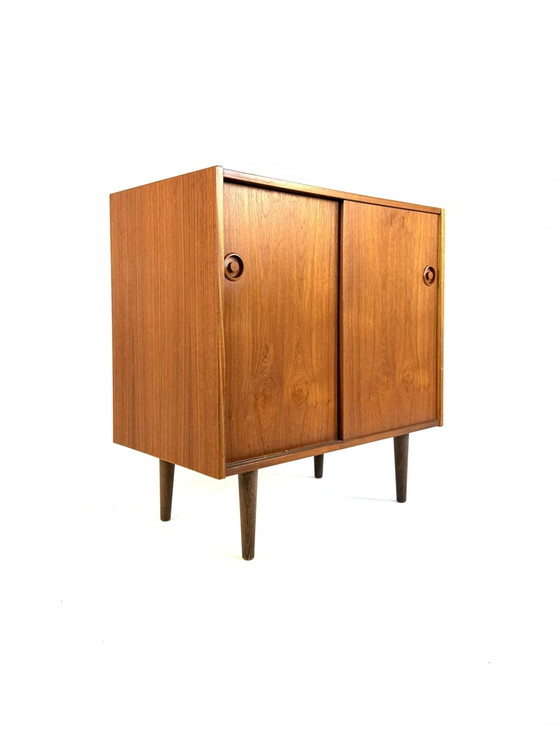 Image 1 of Vintage teak Danish sliding door cabinet '60