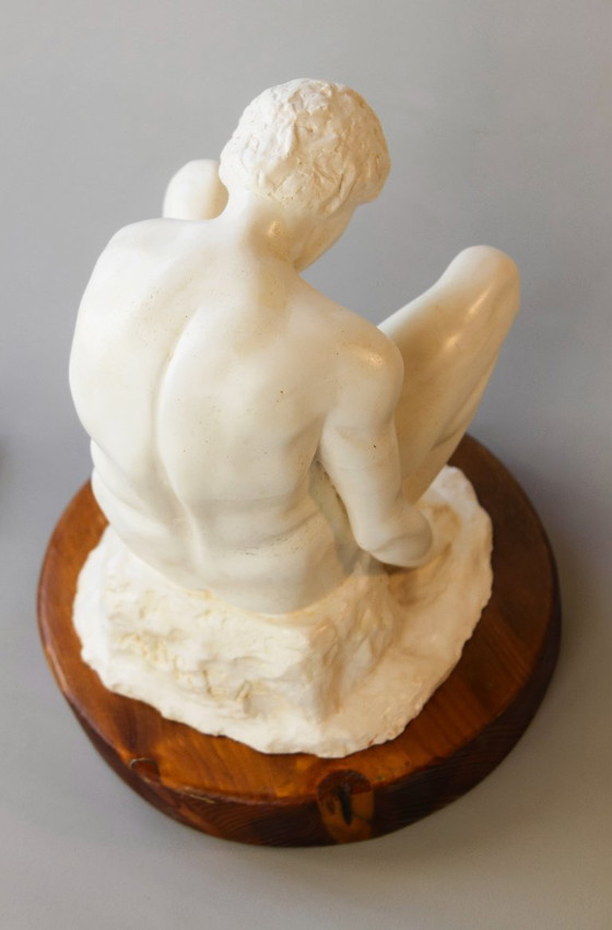 Image 1 of Sculpture of a seated man. Classical male sculpture. Male figure.