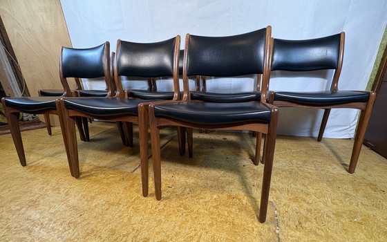 Image 1 of Mid-Century Retro Set of 8 Dining Chairs by Johannes Andersen for Uldum Møbelfabrik 1960  Elevate your dining space with this st