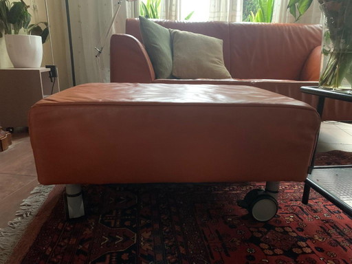 Repose-pieds Jori design en cuir orange, mobile