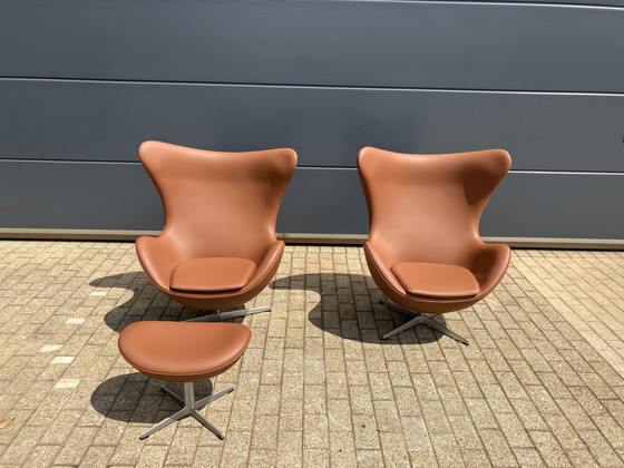 Image 1 of 2x Fritz Hansen Egg Chair + Ottoman en cuir Cognac NEUF !!!