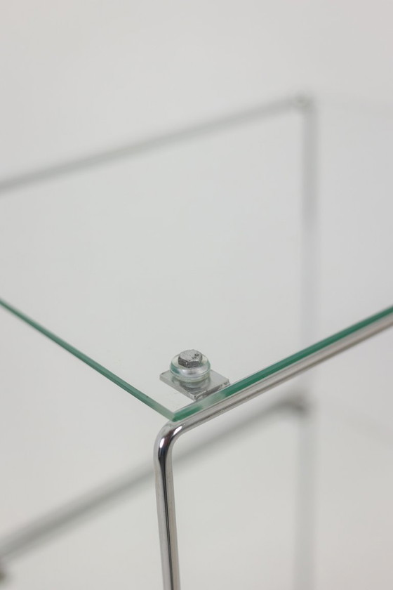 Image 1 of Set of 3 chrome-plated metal and glass shelves. 1970s