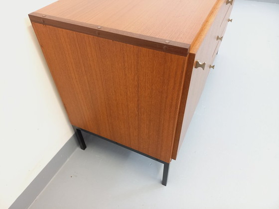 Image 1 of Vintage modernist sideboard by ARP Minvielle, designed by Guariche Mortier Motte, in teak and black metal, from the 1960s