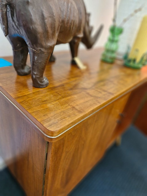 Vintage cabinet slanted legs and swivel top
