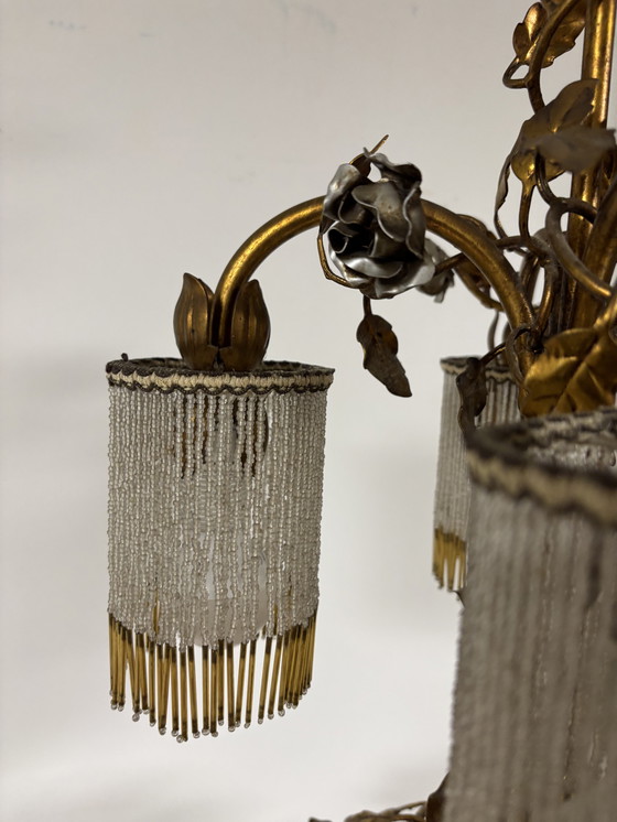 Image 1 of Exclusive chandelier with brass leaves and silver-colored roses