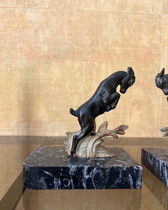 Image 1 of Fermalibri Art Déco vintage – Bronzo e marmo Portor – Francia, 1930