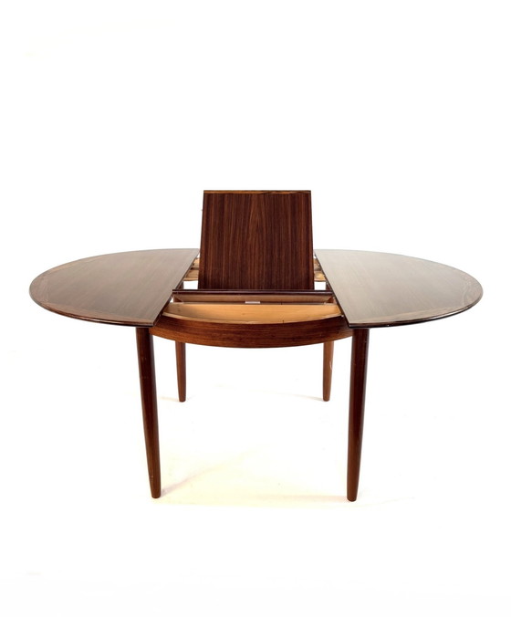 Image 1 of Vintage Rosewood extendable dining table '60