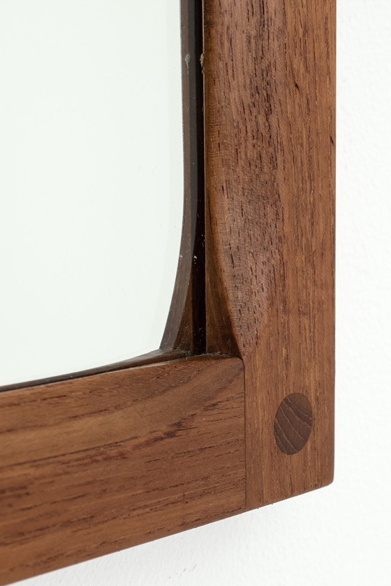 Image 1 of Aksel Kjersgaard in front of Odder Møbler mirror