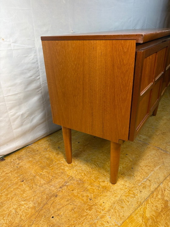 Image 1 of Mid-Century Retro Vintage Teak Sideboard by Nathan 1960s  Square Design • Two Doors • British Design Classic  A striking mid-cen