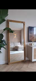 Großer Spiegel in Antikoptik aus Goldbronze mit Facettenschliff