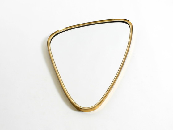 Image 1 of Beautiful heavy mid-century brass kidney-shaped wall mirror from Münchner Zierspiegel