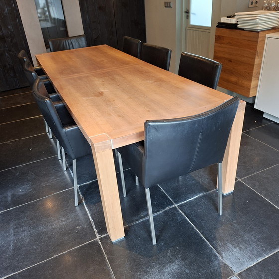 Image 1 of Malofancon dinning table, incl 8 leather chairs.