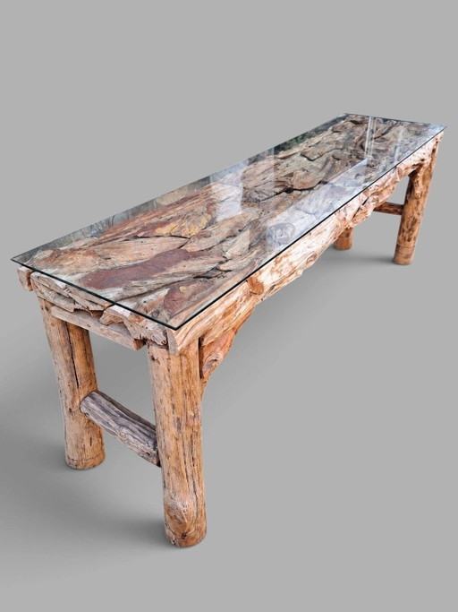 Console en bois de teck flotté unique avec plateau en verre, 240x52cm, 74cm de haut.