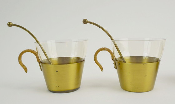 Image 1 of Ensemble de 4 verres à thé style années 50, signés Hein Matten, support en laiton, anses en raphia.