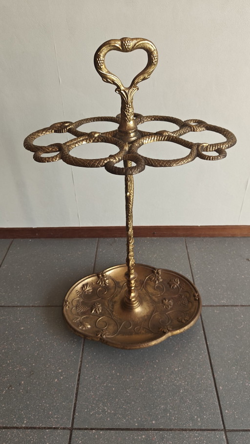Soporte para paraguas de latón con decoración de serpiente