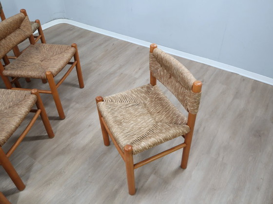 Image 1 of Juego de 8 sillas estilo Charlotte Perriand de los años 60, de paja tejida y madera.