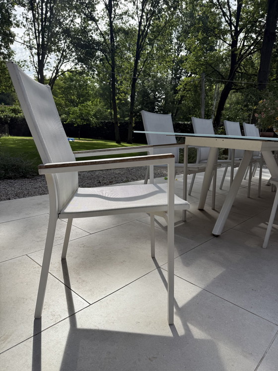 Image 1 of 10 white textile garden chairs
