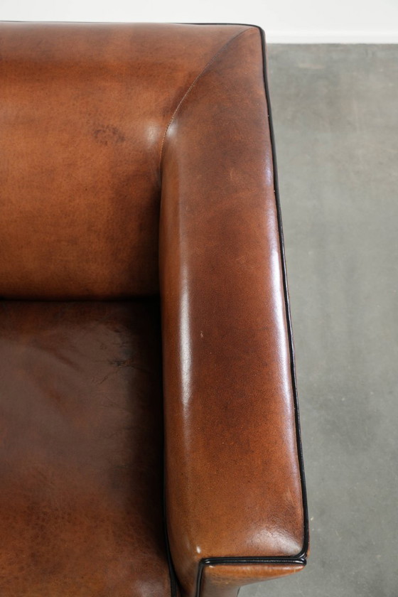 Image 1 of Strakke schapenleren Art Deco design armchair/ fauteuil met zwarte biezen en een prachtige warme kleur