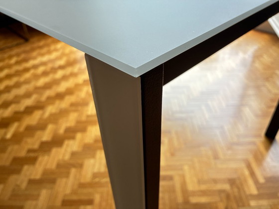 Image 1 of Mesa extensible Thin-K de cristal y acero, marca italiana Kristalia.