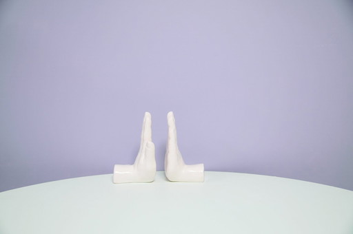 set x2 white porcelain bookend hands