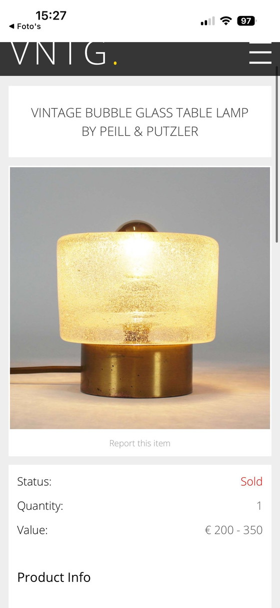 Image 1 of vintage table lamp by Peill & Putzler is made of thick ice glass with brass details