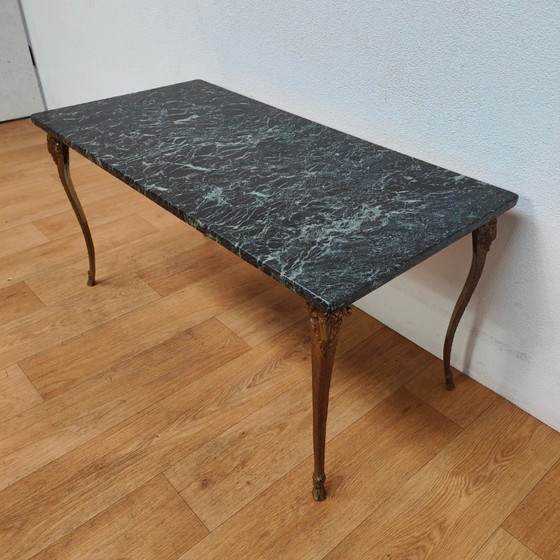 Image 1 of Vintage Regency coffee table with marble top and brass base