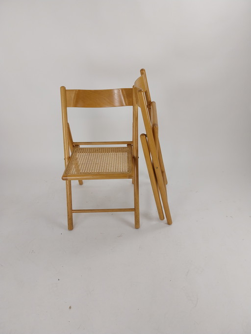 4 x chaises pliantes Mid Century en hêtre avec assise en sangle de rotin