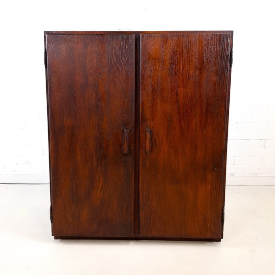 Image 1 of Vintage Art Deco style sideboard with rough dark brown wood