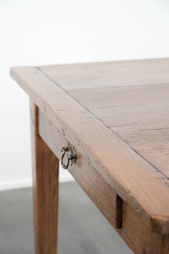 Image 1 of Antique French oak farmhouse dining table for 6 to 8 people with three drawers