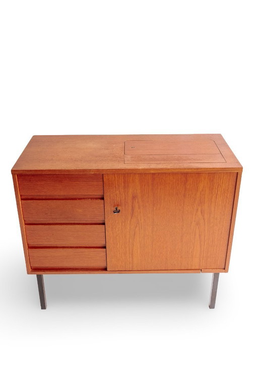 Vintage sideboard with drawers and door