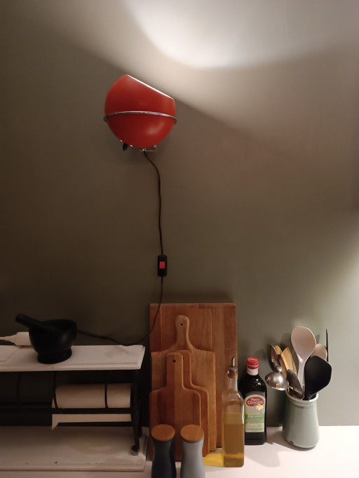 Lámpara de pared con forma de globo ocular de diseño Gepo, naranja