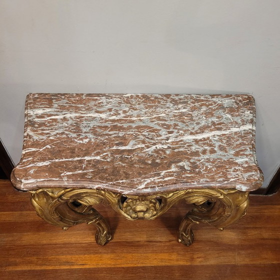 Image 1 of Consolle a muro, in legno intagliato e dorato, stile Luigi XV, XVIII secolo – Francia