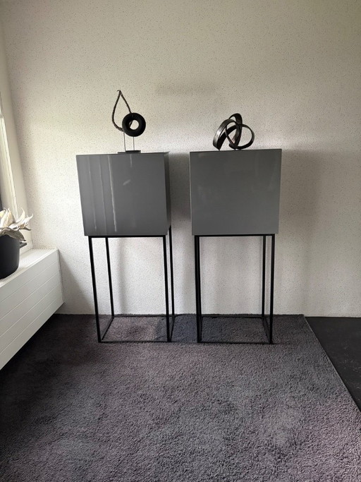 2 grey cabinets on a steel frame